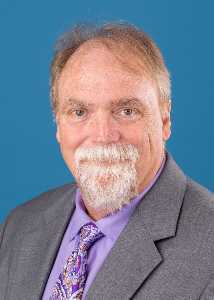 Dr. Charles Etheridge