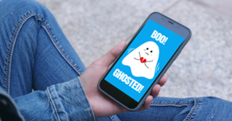 A+ghost+appears+on+a+cell+phone+screen+with+the+caption+Boo%21+Ghosted%21